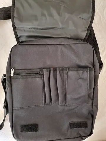 My black messenger shoulder bag with organizer pockets