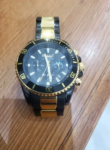 black and gold dive watch