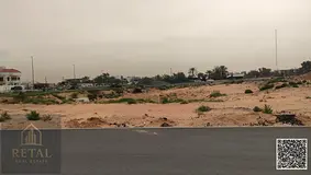 Two Adjacent Plots for Sale in Prime Location – Al Zahia