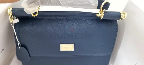 navy leather shoulder bag with gold hardware —  new