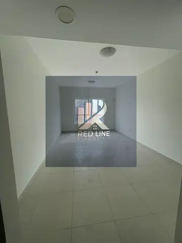 2BHK apartment with a living room in a prime and vibrant location, directly on Al Taawun Roundabout and Dubai exit, with an open view and free parking