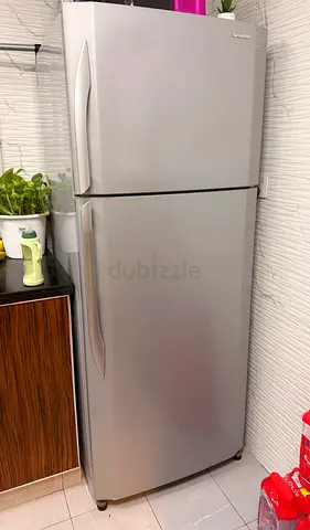 Large Sharp 2-door refrigerator (top freezer) — working condition