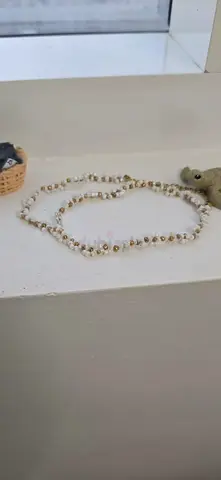 White and gold beaded necklace