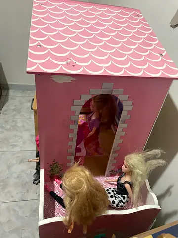 My pink dollhouse with two dolls and furniture and kitchen with cooking pans