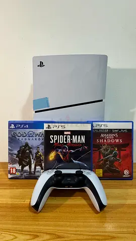 My PS5 console with DualSense controller + 3 games ($% of War Ragnarok, Spider-ManAssassins Cre