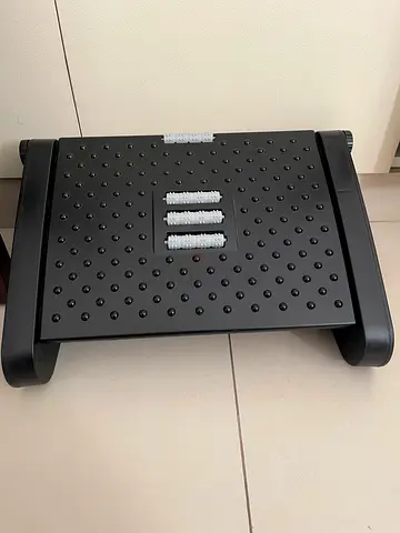 Adjustable footrest and lumbar back cushion