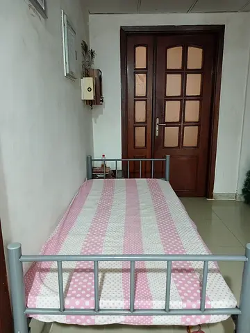 Single metal bed frame with mattress — good condition
