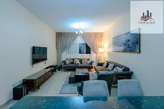 Sharjah, Al Taawun, Al Hijri Tower, two bedrooms, living room, kitchen, two bathrooms, and balcony.