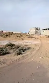 Industrial Land for Rent in Umm Al Thuoub 43,594 Sqft on Main Road