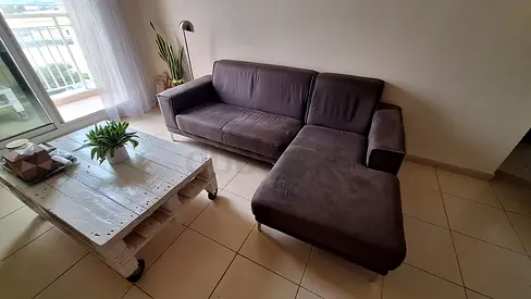 L-shaped 3-seater brown sofa