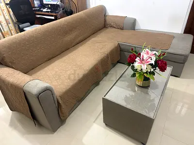 Grey L-shaped sectional sofa with ottoman - used, well kept and in good condition