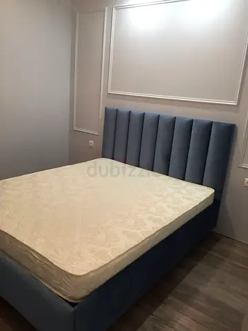 New Blue upholstered bed frame with mattress