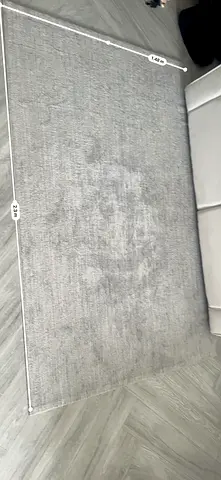 Light grey solid rug 1.48m x 2.3m gently used