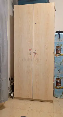My 2-door light wood wardrobe - good used condition with spacious 4 layer
