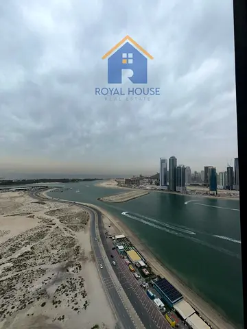 1BR Sea View Apartment with Balcony and Parking