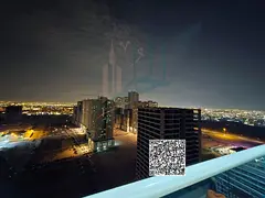 For sale: 2-bedroom apartment with a living room in Golf Tower, Emirates City, Ajman.