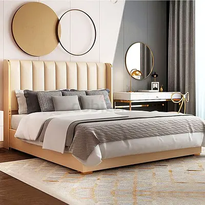 Modern beige upholstered bed with padded headboard