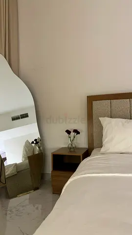 Wooden bed, side table , mattress/ good condition
