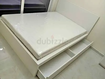 IKEA malam double‑size bed (140 × 200 cm) with 2 storage drawers underneath and an IKEA mattress