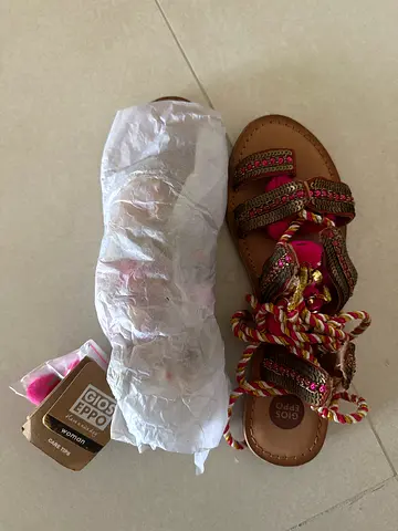 Never-worn braided lace-up sandals with tags (women)