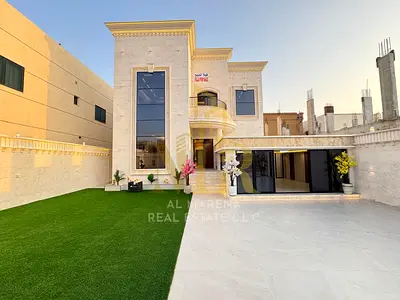 Villa in Al Muwaihat 1, commercial use, two floors and a roof, price includes electricity, water and air conditioning, on the main street, ready to mo