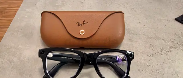 My Ray-Ban black Wayfarer glasses with original tan case