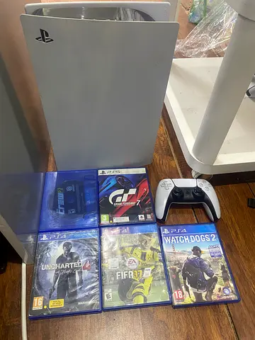Ps5 disc version with logitech G29 steering wheel 2 controllers, box and few cds