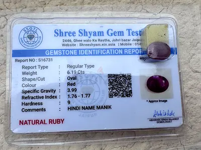 Natural ruby (6.19 ct, oval) with gem identification report