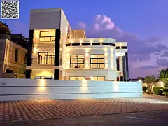 Modern villa on a corner lot with a large setback, garden, and roof terrace. Price includes registra