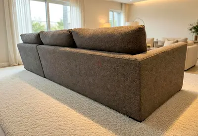 Cratebarrel sectional feather filled sofa
