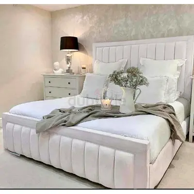 White Upholstered Bed Frame with Padded Headboard