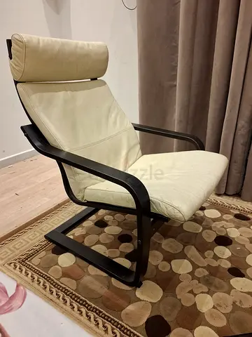 Cream leather armchair with dark bentwood frame
