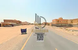 🏡 Corner Residential &amp; Commercial Land for Sale in Al Mowaihat 1 – Prime Location on a Main