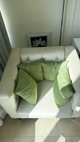 Elegant White Leather Armchair with Cushions