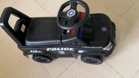 My childs police ride-on car - good condition