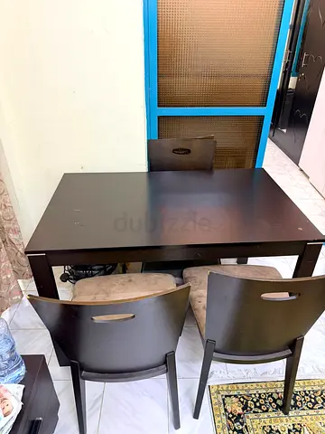 3-seater dark wood dining table with chairs - good condition