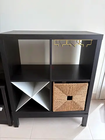 Small dark wood bar cabinet with wine rack and glass holders