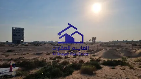 [ فرصة استثمار لا تتكرر | أرض تجارية سكنية على شارع رئيسي في الرويضات – الشارقة ]