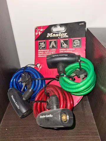 My set of 3 Master Lock bike cable locks (green, red, blue)