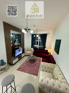One-bedroom apartment with a living room for annual rent in City Towers