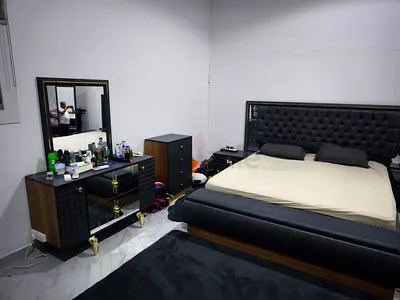 Gray tufted upholstered bed with dresser and mirror - bedroom set (Full master bedroom)