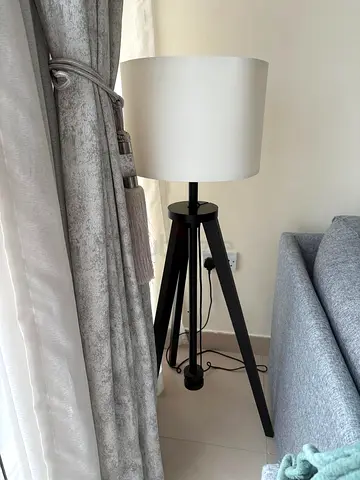 Tripod floor lamp with white shade