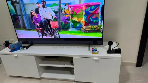 White TV Entertainment Unit with Cabinets and Open Shelves