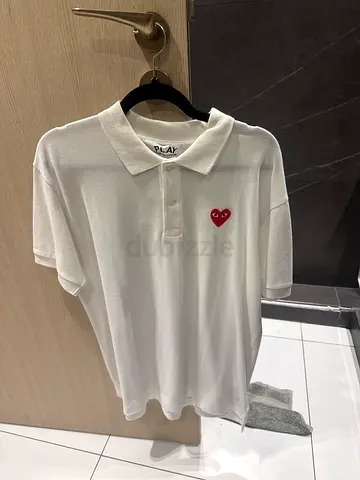 Comme des Garçons PLAY white polo with red heart logo — gently used