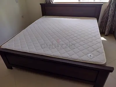 My wooden bed frame with mattress (Home Centre)— solid, gently used, king size 200x180cm. With cover