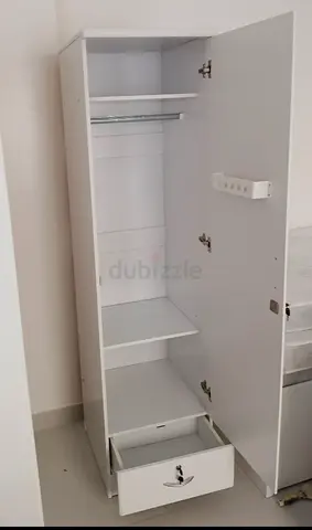 Modern White Wardrobe with Shelves and Drawer