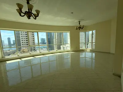 Luxury 2-bedroom apartment with a spacious living room and excellent view, free parking, free AC, gym & pool in Al Majaz 3.
