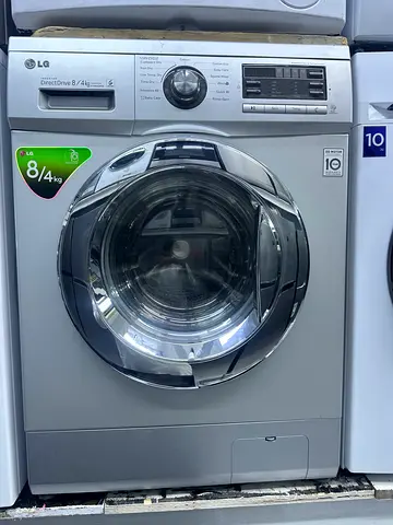 LG washing machine 8 kg washing and 4 kg dryer same like a new condition