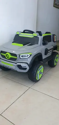 Kids Electric Ride-On Car - with charger and remote