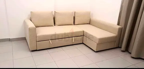 Ikea L Shape Sofa cum bed with big storage in L